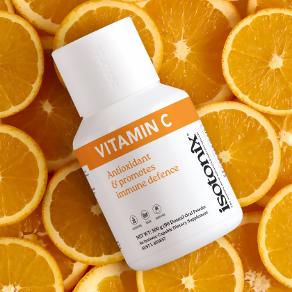 image of Isotonix Vitamin C on top of orange slices