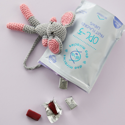 DNA Miracles OPC-3 Chews, with open bag, showing chews and gray mouse toy leaning on product