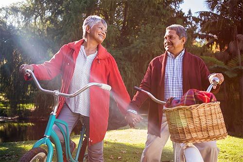 2 people riding bikes